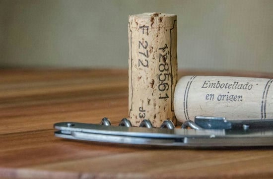 How to put cork back in wine bottle