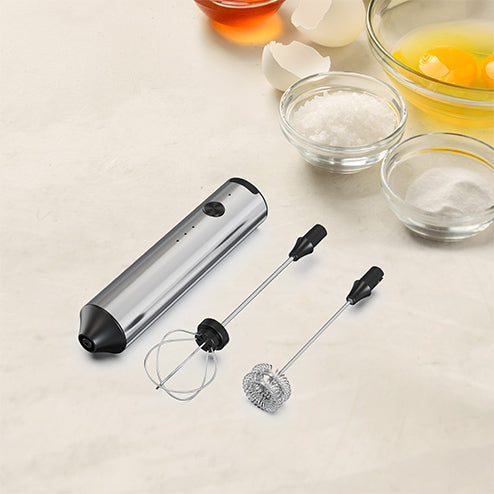 Electric milk frother with changing head